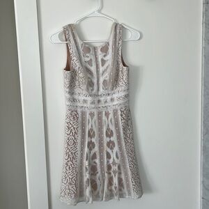White BCBG Maxarzia lace dress fit and flare with cream lining